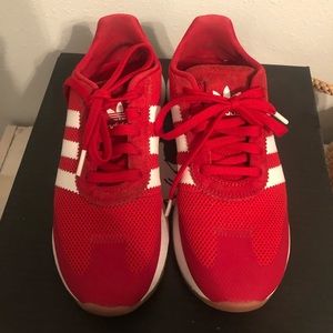 Adidas red sneakers